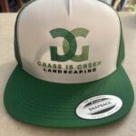 Hat showing Vivid Arc Digital Marketing custom branding on apparel